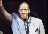  ?? Frank Franklin II / Associated Press ?? Harthorne Wingo waves to the crowd during a ceremony to honor the 1972-73 world champion Knicks at Madison Square Garden in 2013. The former Knick and fan favorite has died. His death in a New York City hospital on Jan. 13 was confirmed by the coroner’s office. No cause was given.