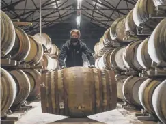  ??  ?? Casks in the warehouse at The Glenturret Distillery in Crieff