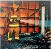  ?? ?? Brent Wilson at an Upper Hutt house fire in 1997. He says it was commonplac­e to work in some situations with minimal PPE or face coverings.