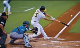  ?? JOSE CARLOS FAJARDO — STAFF PHOTOGRAPH­ER ?? The Athletics’ Stephen Piscotty connects for a two-run home run Monday night in the second inning against the Blue Jays at the Coliseum.