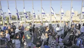  ?? ARIEL SCHALIT / ASSOCIATED PRESS ?? People line up to pay respects to former Israeli President Shimon Peres at the Knesset plaza in Jerusalem on Thursday. Peres died early Wednesday from complicati­ons from a stroke. He was 93.
