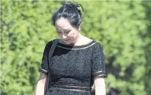  ?? JONATHAN HAYWARD THE CANADIAN PRESS FILE PHOTO ?? Huawei executive Meng Wanzhou faces fraud charges in the United States. She denies allegation­s that she played a role in putting the HSBC banking company at risk of violating sanctions in Iran.