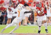  ?? BRYNN ANDERSON/ASSOCIATED PRESS ?? Alabama quarterbac­k Jalen Hurts runs against Tennessee defensive back Rashaan Gaulden during Saturday’s game.