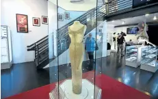  ?? GETTY IMAGES FILES ?? The dress worn by Marilyn Monroe is shown on display in a glass enclosure at Julien’s Auction House in Los Angeles, Calif. The dress made its Canadian