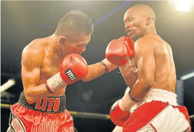  ?? Picture: GALLO IMAGES ?? FISTS OF FURY: Simphiwe Konkco, right, in action against Filipino Lito Dante, will take on another Filipino, Toto Landero, on Sunday.