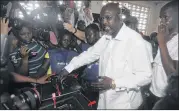  ?? ABBAS DULLEH / ASSOCIATED PRESS 2017 ?? Former soccer star George Weah casts his vote in the first round of Liberia’s presidenti­al election in Monrovia in October. Weah was elected president last week in the second round of voting.