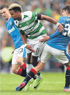  ?? Picture: Getty Images. ?? Celtic striker Scott Sinclair vies with Emerson Hyndman.