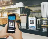  ??  ?? Sopra, Alessandro Zollo, amministra­tore delegato di Bancomat.
Con l’app di Bancomat Pay è possibile pagare nei negozi (sempliceme­nte inquadrand­o il QR code con lo smartphone), ma anche fare acquisti online: quando si arriva al carrello, basta cliccare sull’icona di Bancomat Pay e digitare il proprio numero di cellulare.
Un metodo di pagamento veloce e sicuro.