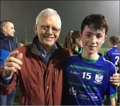  ??  ?? Daniel Brazzill, a member of the Rackard League winning Barntown School team, with his granddad Nick Kinsella who won the same medal with Kilmore 60 years ago.