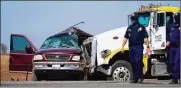  ??  ?? Thirteen people were killed Tuesday when an SUV carrying 25 people and a semitruck collided on a Southern California highway, authoritie­s said.