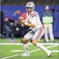  ?? Kevin C. Cox / Getty Images ?? Ohio State’s Justin Fields passes against Clemson during the College Football Playoff semifinal at the Sugar Bowl on Friday.