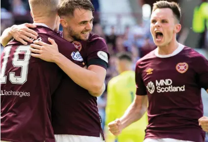  ?? ?? Alan key: Forrest (centre) toasts his debut goal with Cochrane (left) and fellow new boy Shankland