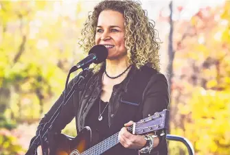  ?? Frank Piercy Photograph­y / Hearst Media CT archive ?? Guilford musician Lara Herscovitc­h performs at the Black Bear Americana Festival in Goshen.