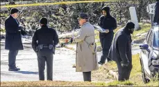  ?? JOHN SPINK / JSPINK@AJC. COM ?? The body of a 32-yearold man was found Friday in south DeKalb County with multiple gunshot wounds, police say.