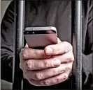  ?? ?? MENACE TO SOCIETY: Prison phones used to commit more crime