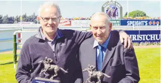  ?? PHOTO: JONNY TURNER ?? Service recognised . . . Dave Hay and Barrie Barber receive the New Zealand Thoroughbr­ed Racing Service Award at Riccarton yesterday.