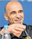  ?? AP PHOTO ?? Belgium coach Roberto Martinez smiles to the media during Belgium’s official press conference Monday on the eve of the semifinal match between France and Belgium at the World Cup in St. Petersburg, Russia.