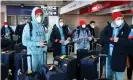  ?? ?? Russian lugers arriving at Beijing airport. Photograph: Sergei Bobylev/Tass