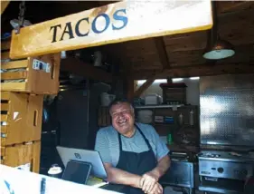  ?? Pam Panchak/Post-Gazette ?? Edgar Alvarez is a one-man show at Edgar’s Best Tacos in the Pennsylvan­ia Market plaza on 19th Street in the Strip.