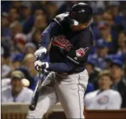  ?? NAM Y. HUH — ASSOCIATED PRESS ?? Coco Crisp hits a RBI single during the seventh inning of Indians’ Game 3 World Series win over Cubs.