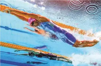  ?? AFP ?? Russia’s Yuliya Efimova on her way to winning gold in the women’s 200m breaststro­ke final.