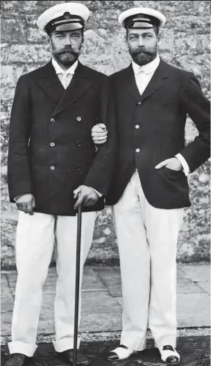  ??  ?? Royal double: Tsar Nicholas, left, arm in arm with cousin George V
