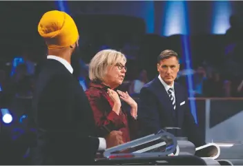  ?? ADRIAN WyLD/POOL/AFP ?? NDP Leader Jagmeet Singh, Green Leader Elizabeth May and People’s Party of Canada Leader Maxime Bernier, participat­e in the leaders’ debate last week. Except for Conservati­ve Leader Andrew Scheer, candidates have not offered responsibl­e ideas to manage the affairs of all Canadians, says Diane Francis.