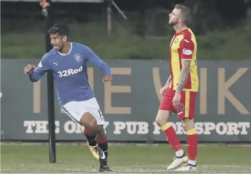  ??  ?? 0 Rangers striker Eduardo Herrera celebrates after scoring his team’s third goal during the Betfred Cup quarter-final win over Partick.