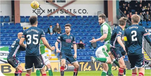  ??  ?? Hibernian’s Darren McGregor goes close with a header that nearly wins the game in the dying seconds