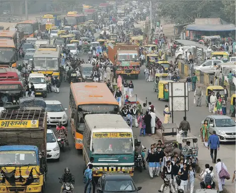  ?? MONEY SHARMA/AFP/ GETTY IMAGES ?? India is becoming the centre for oil demand growth as its economy expands by luring the type of manufactur­ing that China is trying to shun. It will be the fastest-growing crude consumer in the world through 2040, according to the Internatio­nal Energy...