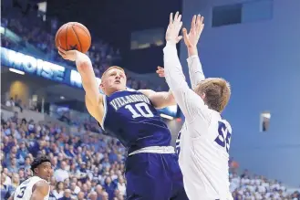  ?? JOHN MINCHILLO/ASSOCIATED PRESS ?? Donte DiVincenzo (10) and his Villanova teammates endured a stunning loss to Marquette a week ago, yet the Wildcats are still seen as the best team in the land by the NCAA Selection Committee.