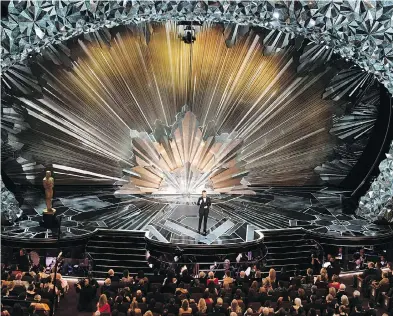  ?? MARK RALSTON / AFP / GETTY IMAGES FILES ?? Jimmy Kimmel hosts the 90th Annual Academy Awards show in March. Organizers announced Wednesday the creation of a category to honour top blockbuste­rs and said they would shorten the awards ceremony.