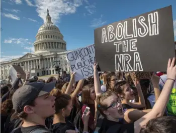  ?? Scott Applewhite, File) (AP Photo/J. ?? In this Feb. 21, 2018, photo, school students from Montgomery County, Md., in suburban Washington, rally in solidarity with those affected by the shooting at Marjory Stoneman Douglas High School in Florida, at the Capitol in Washington. Member of...