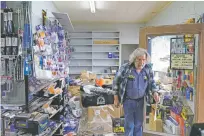  ?? GODOFREDO A. VÁSQUEZ/ASSOCIATED PRESS ?? Kenny Ransbottom walks through debris inside his auto parts store after an earthquake Tuesday in Rio Dell, Calif.