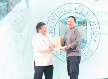  ?? ?? The MORE Power President and CEO handed over the Plaque of Recognitio­n to Iloilo Governor Arthur Defensor Jr. for the partnershi­p in the developmen­t provided to MORE Power.