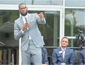  ?? PHIL LONG/AP ?? LeBron James opened the I Promise School last Monday in Akron, Ohio. The school is supported by the The LeBron James Family Foundation and is run by the Akron Public Schools.
