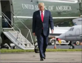  ?? PABLO MARTINEZ MONSIVAIS — THE ASSOCIATED PRESS FILE ?? In this file photo, President Donald Trump walks across the tarmac from Marine One to board Air Force One at Morristown Municipal Airport in Morristown, N.J. Bombarded by the sharpest attacks yet from fellow Republican­s, President Donald Trump on...