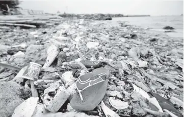  ??  ?? File photo shows plastic and styrofoam garbage litters the shoreline in Cilincing in Jakarta, Indonesia. — Reuters photo