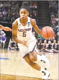  ?? Lori Van Buren / Albany Times Union ?? UConn’s Crystal Dangerfiel­d, left, was named to the watch list for the Nancy Lieberman Award, which is given annually to the nation's top point guard.