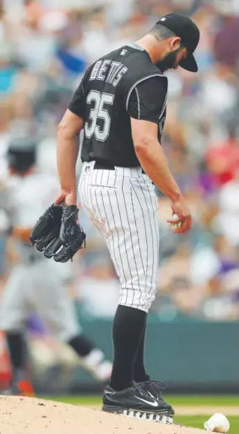  ?? David Zalubowski, The Associated Press ?? Rockies starting pitcher Chad Bettis wasn’t able to keep up with Tigers ace Justin Verlander, giving up five runs in five innings Wednesday in the 6-2 loss.