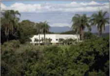  ?? SILVIA IZQUIERDO — THE ASSOCIATED PRESS ?? This Wednesday photo shows the Word of Faith Fellowship church in Sao Joaquim de Bicas, Brazil. An Associated Press investigat­ion has found that the church used its two branches in Latin America’s largest nation to siphon a steady flow of young...