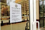  ?? [PHOTO BY NATE BILLINGS, THE OKLAHOMAN] ?? The IRS’s Taxpayer Advocate Services office at 55 N Robinson is closed because of the government shutdown. Officials posted a notice as shown in this photo taken Thursday.