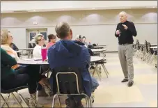  ?? Lynn Kutter Enterprise-Leader ?? Ken James with McPherson & Jacobson LLC facilitate­s a community meeting Feb. 8 to gather public input for the search to hire Prairie Grove School District’s next superinten­dent.