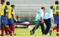  ?? /Getty Images ?? Marc-vivien Foe of Cameroon is stretchere­d off the field during the Confederat­ion Cup semifinal in 2003 at the Stade Gerland Lyon,
France.