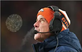  ?? RJ SANGOSTI — THE DENVER POST ?? Denver Broncos head coach Sean Payton looks off during a cold night at Empower Field at Mile High in Denver on Dec. 24, 2023.