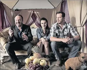  ??  ?? IT'S COMPLICATE­D: Gil Bellows, Katie McGrath and Bok van Blerk trapped in an awkward moment in a scene from Henk Pretorius’ rom-com, Leading Lady.