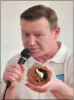  ??  ?? Paul Cremin of Irish Water shows pupils a 100-year-old water pipe.