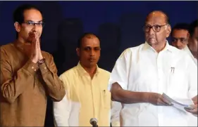  ?? IANS ?? Shiv Sena chief Uddhav Thackeray and NCP President Sharad Pawar at a joint press conference in Mumbai, on 23 November.