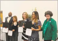  ??  ?? Award winners of the evening include, from left, gentleman accepting the award for Eden Bautista; Haidee Azul; Mary Hannah, winner of the Grace E. Brown award; Nona Alexander, Nurse of the Year Award winner; and Maryland Nurses Associatio­n District 9...