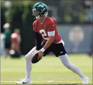  ?? Adam Hunger / Getty Images ?? Zach Wilson of the New York Jets during practice at Atlantic Health Jets Training Center on Friday in Florham Park, N.J.